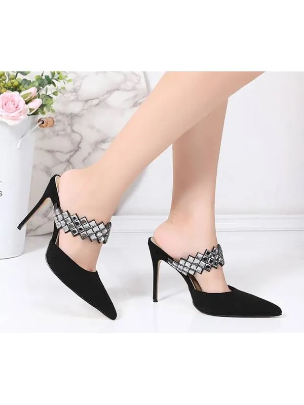 Black suede Stella mules with rhinestone strap.