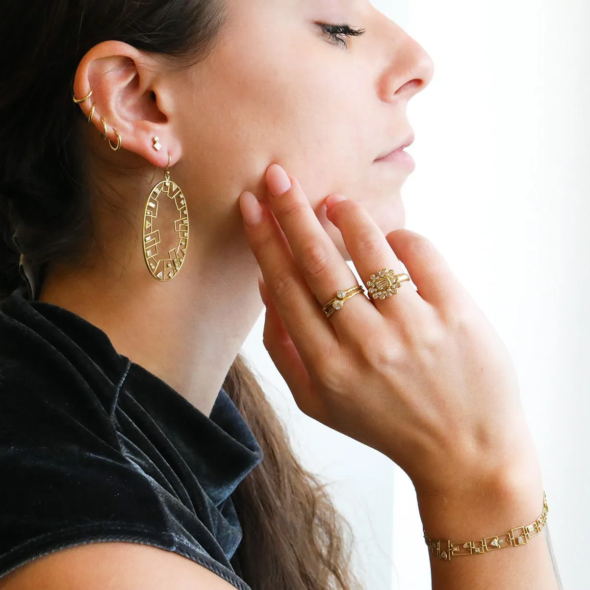 Gold Bezel-Set Emerald-Cut Diamond Ring with Teardrop Halo