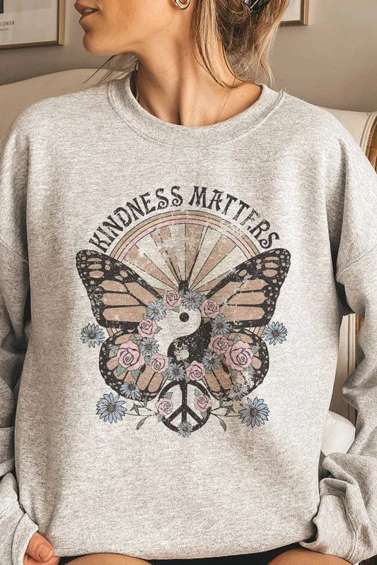 Graphic sweatshirt promoting kindness.