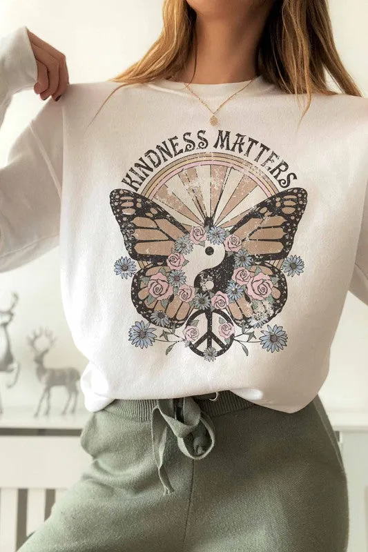 Graphic sweatshirt promoting kindness.