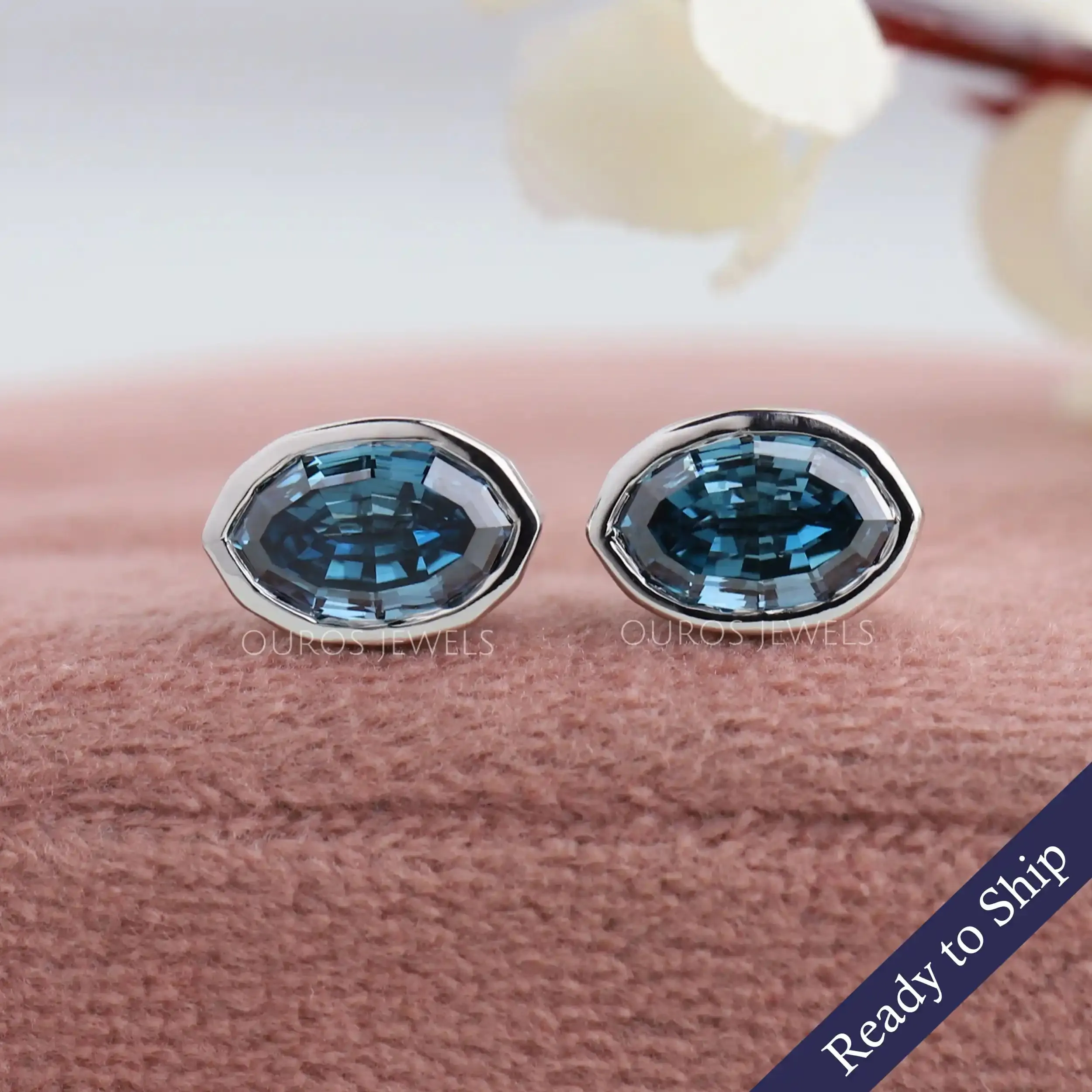 Step Cut Blue Oval Diamond Bezel Set Stud Earrings