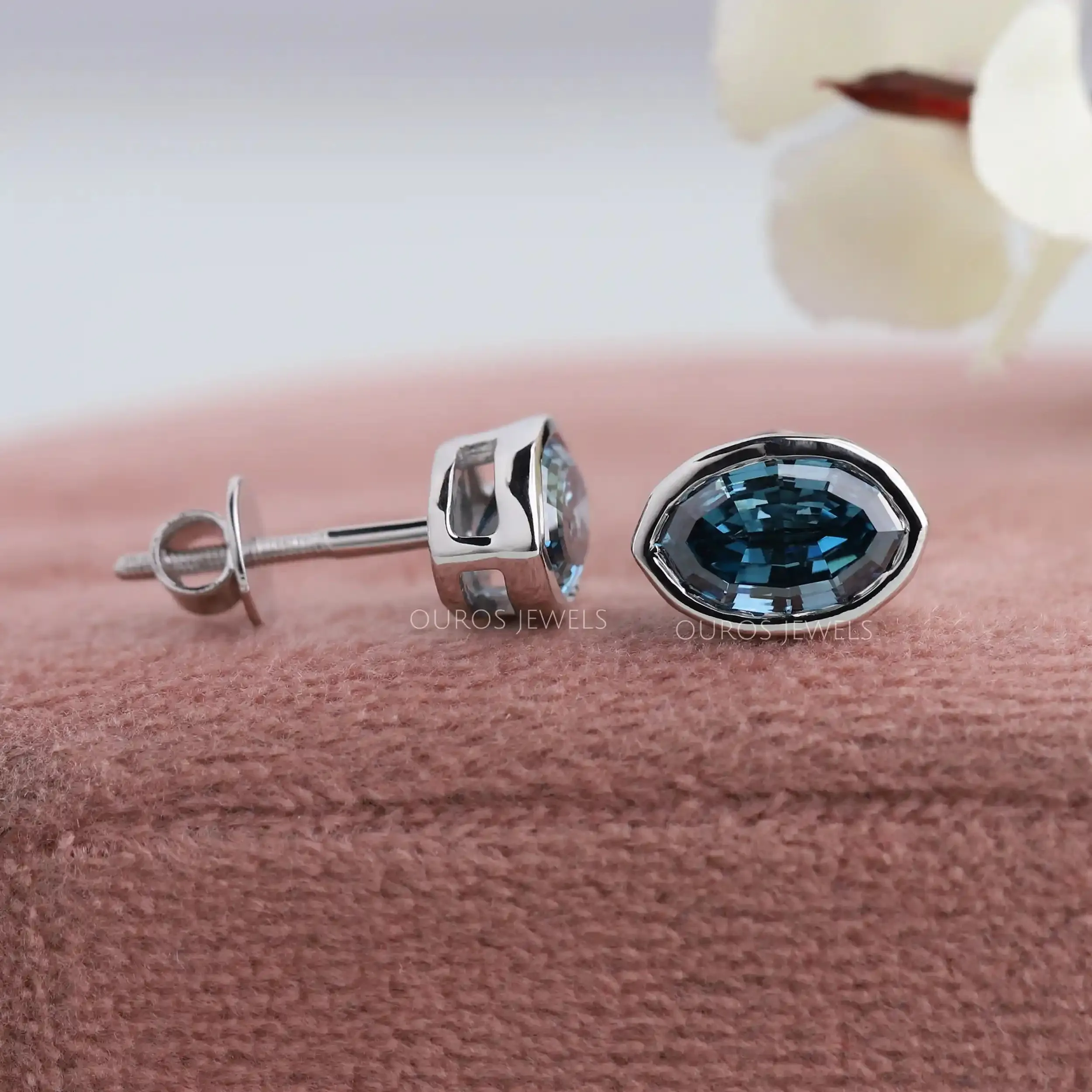 Step Cut Blue Oval Diamond Bezel Set Stud Earrings