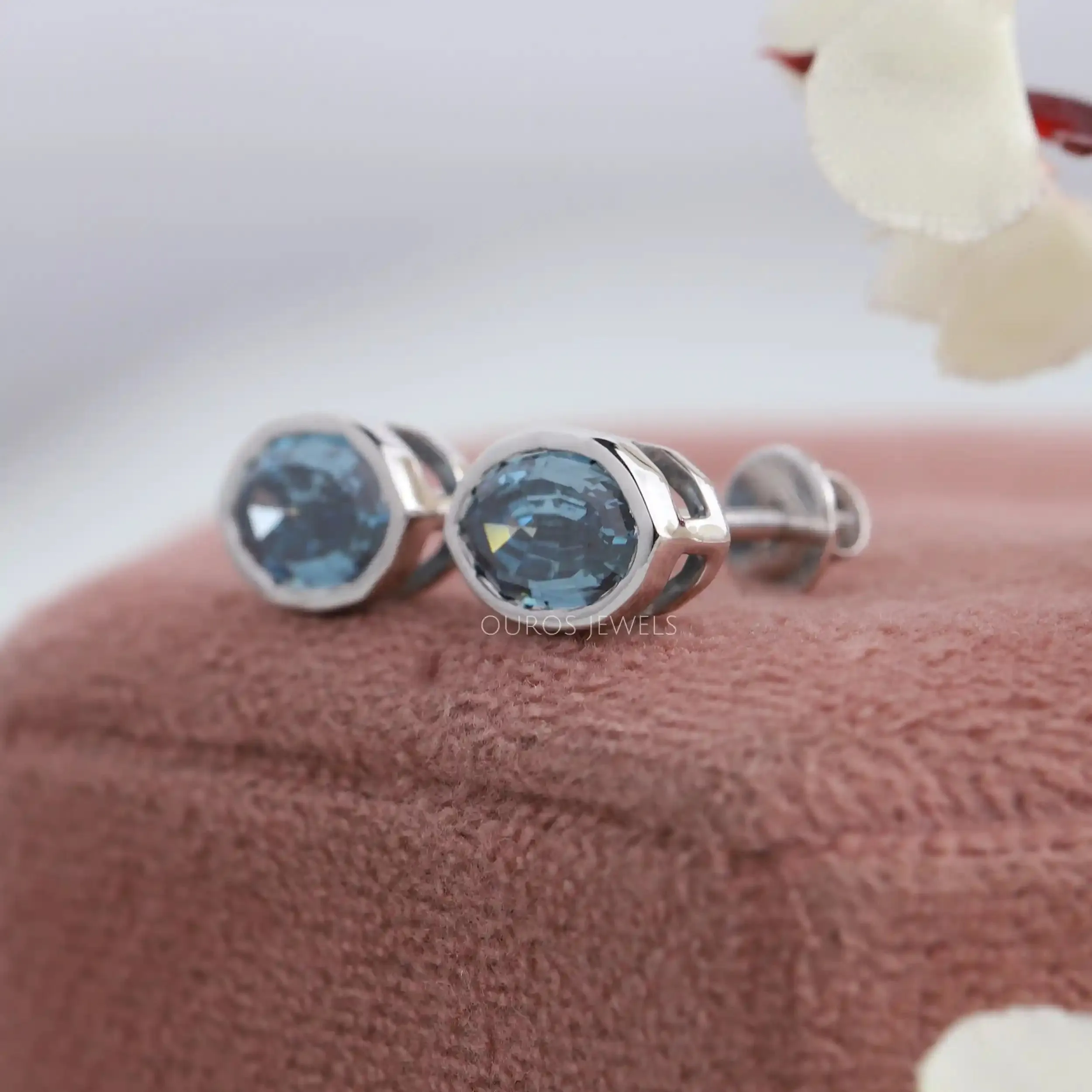 Step Cut Blue Oval Diamond Bezel Set Stud Earrings