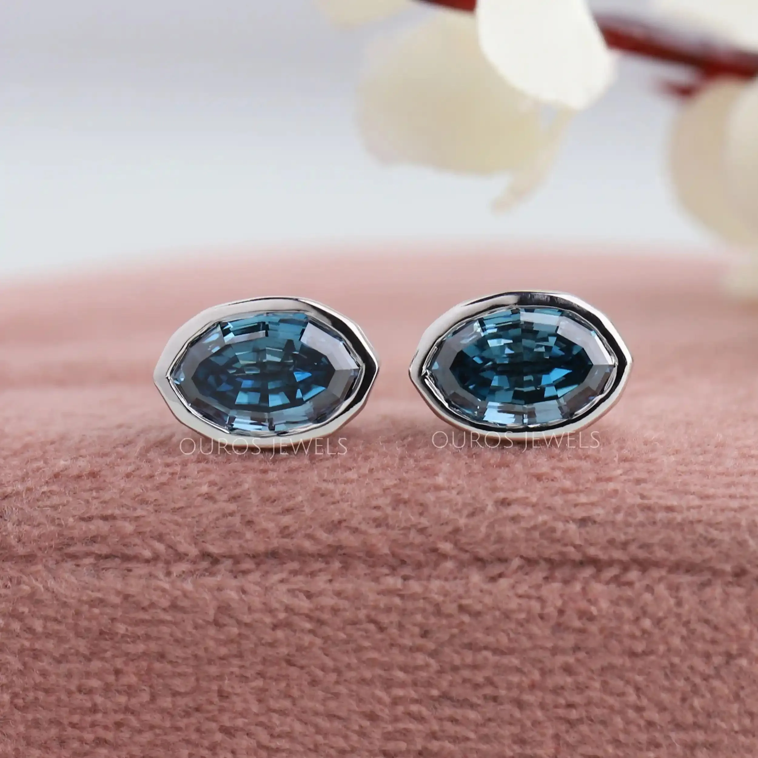 Step Cut Blue Oval Diamond Bezel Set Stud Earrings